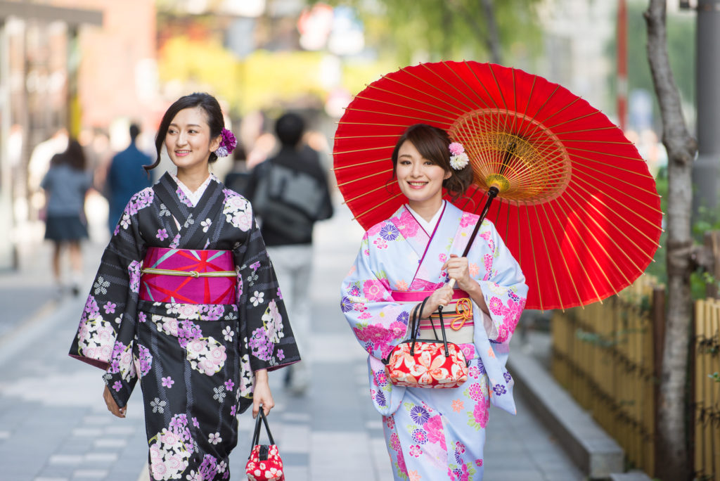 japanese women with kimono walking in tokyo