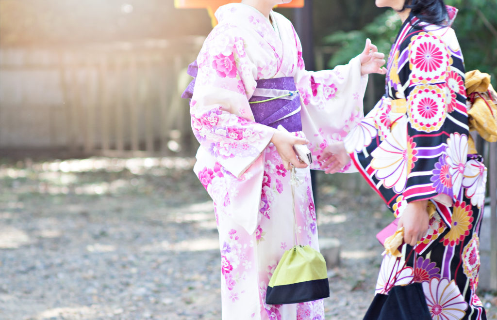 young women wearing traditional japanese kimono at kyoto, japan.